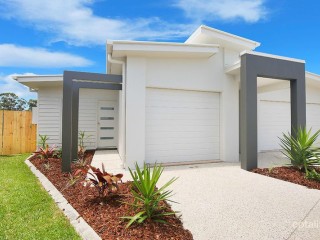 Positioned in sought-after Creekwood Estate