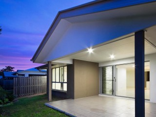 Modern Coastal Living with Pool Access in Gated Community